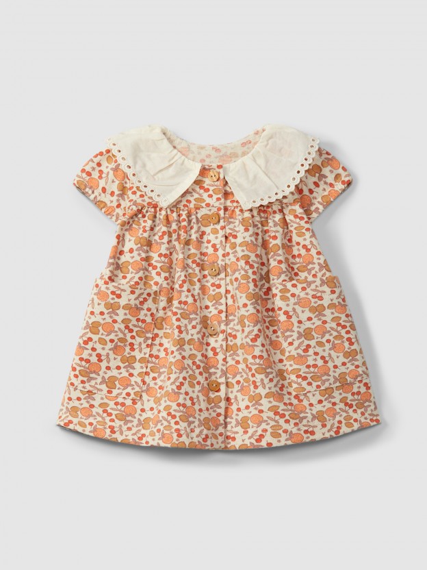 Vestido em malha estampada com detalhe bordado