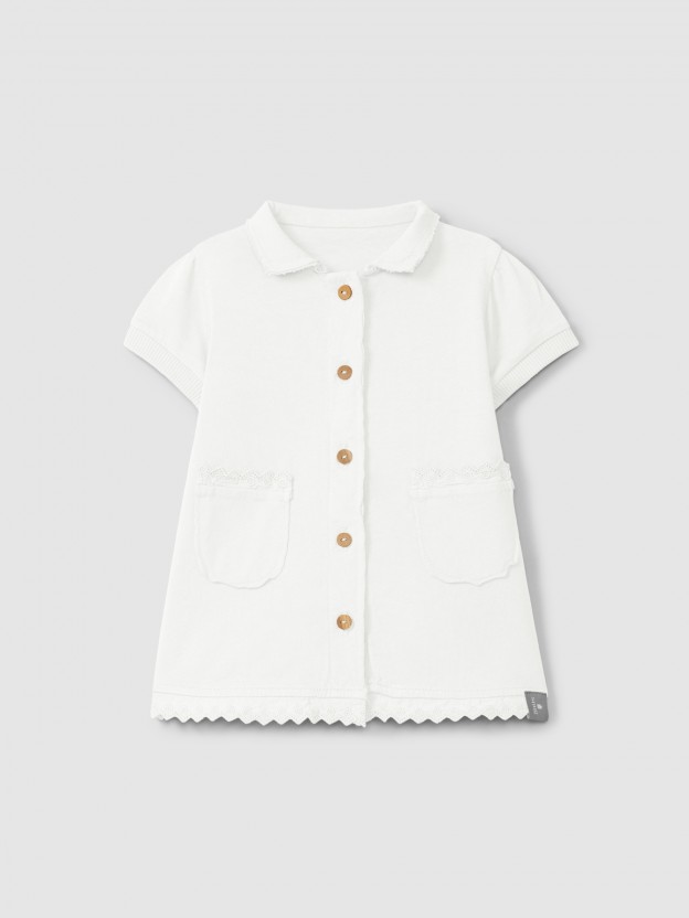 Robe en maille unie avec d�tails brod�s