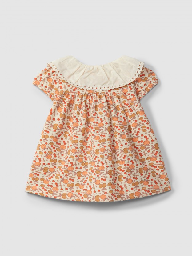 Vestido em malha estampada com detalhe bordado