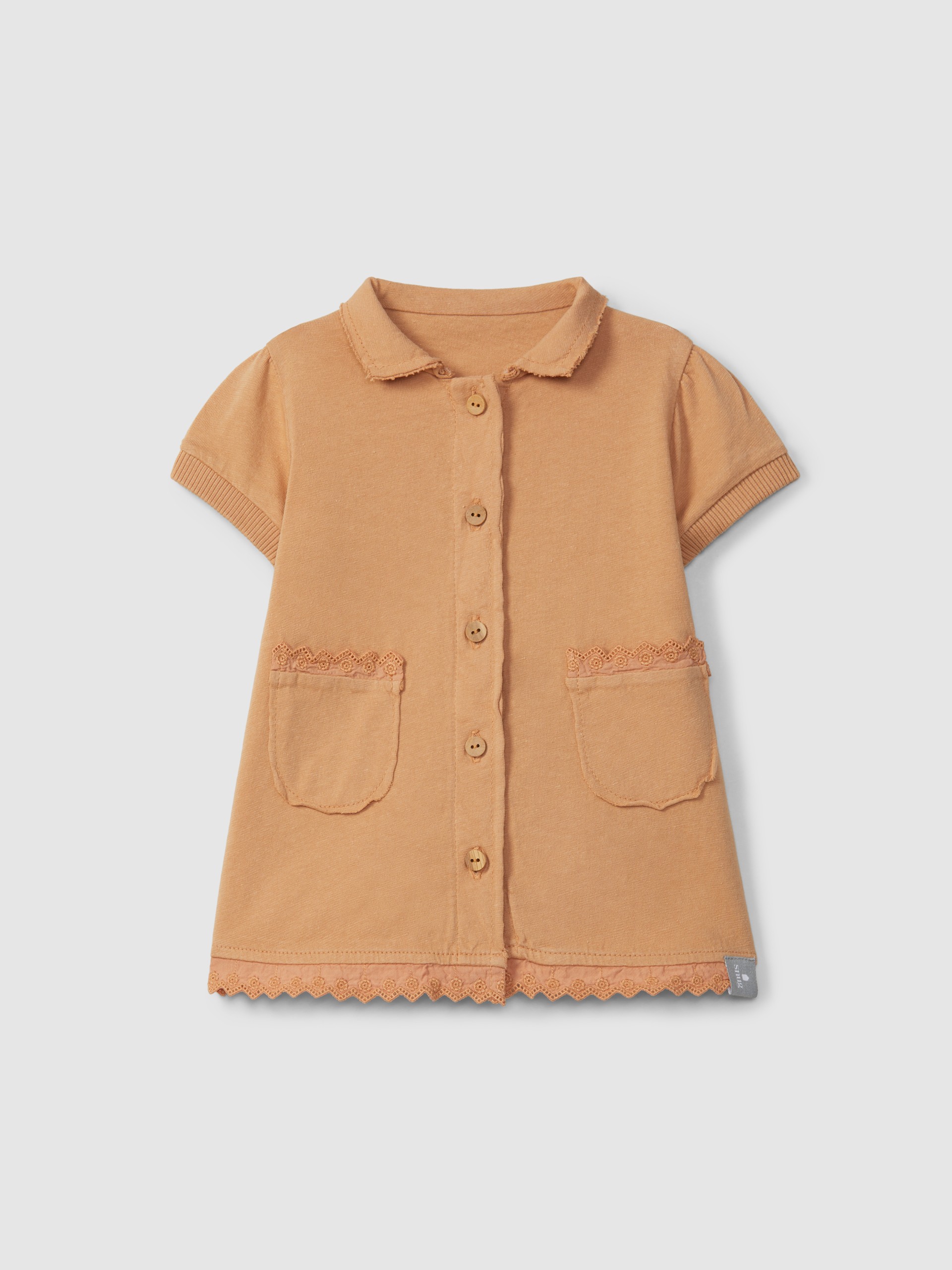 Robe en maille unie avec détails brodés