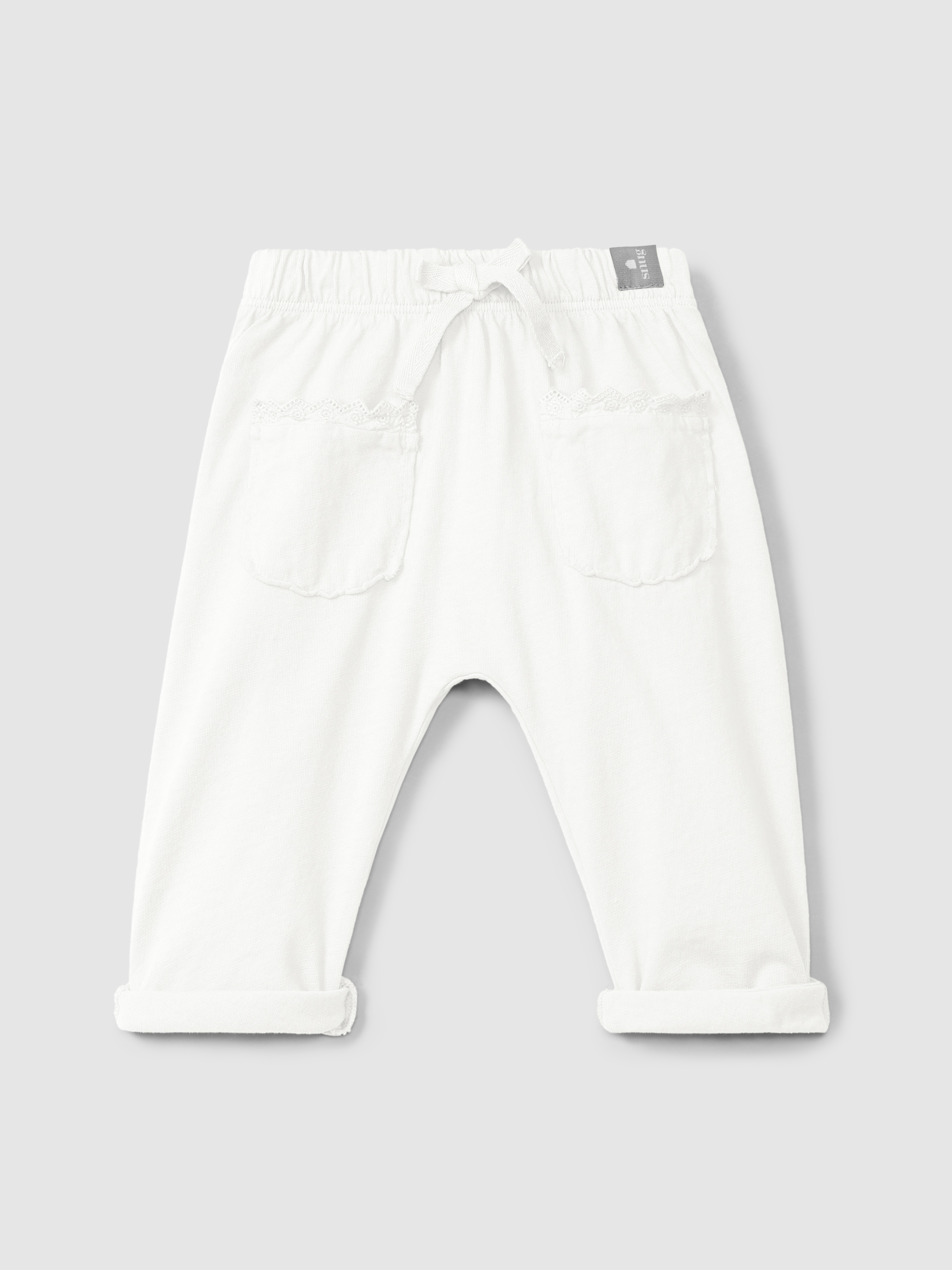 Pantalón pull-up en punto liso con detalles bordados