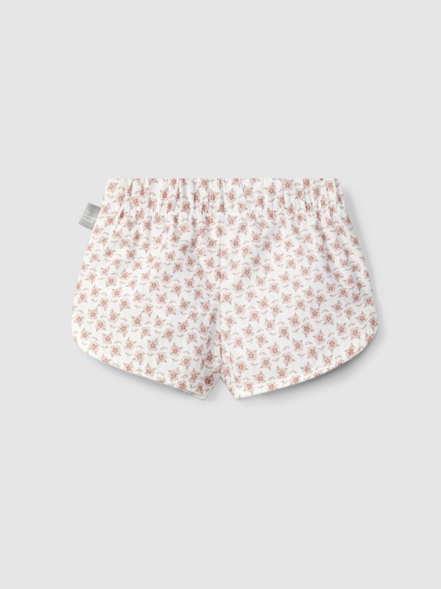 Cal��es pull-up flores com detalhe de espiguilha