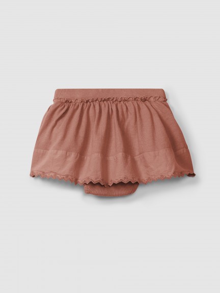 Saia com tapa fraldas detalhe bordado inglês Saia com tapa fraldas detalhe bordado inglês