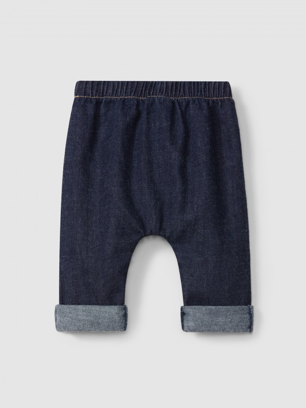 Calças pull-up em denim de algodão orgânico Calças pull-up em denim de algodão orgânico