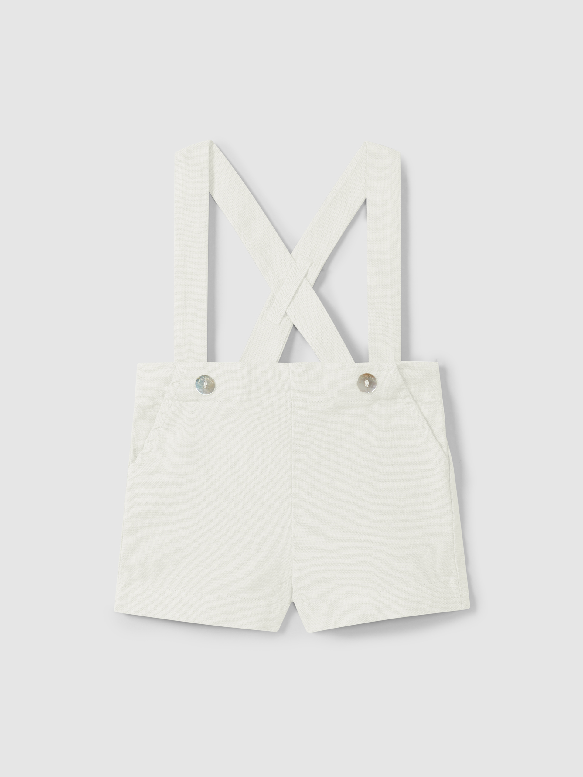Short à bretelles en tissu uni