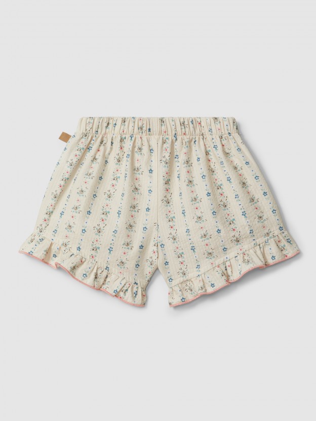 Cal��es pull-up estampado floral com detalhe de folho