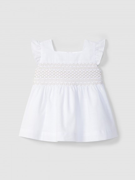 Dress in textured cotton with smocking on the chest Dress in textured cotton with smocking on the chest