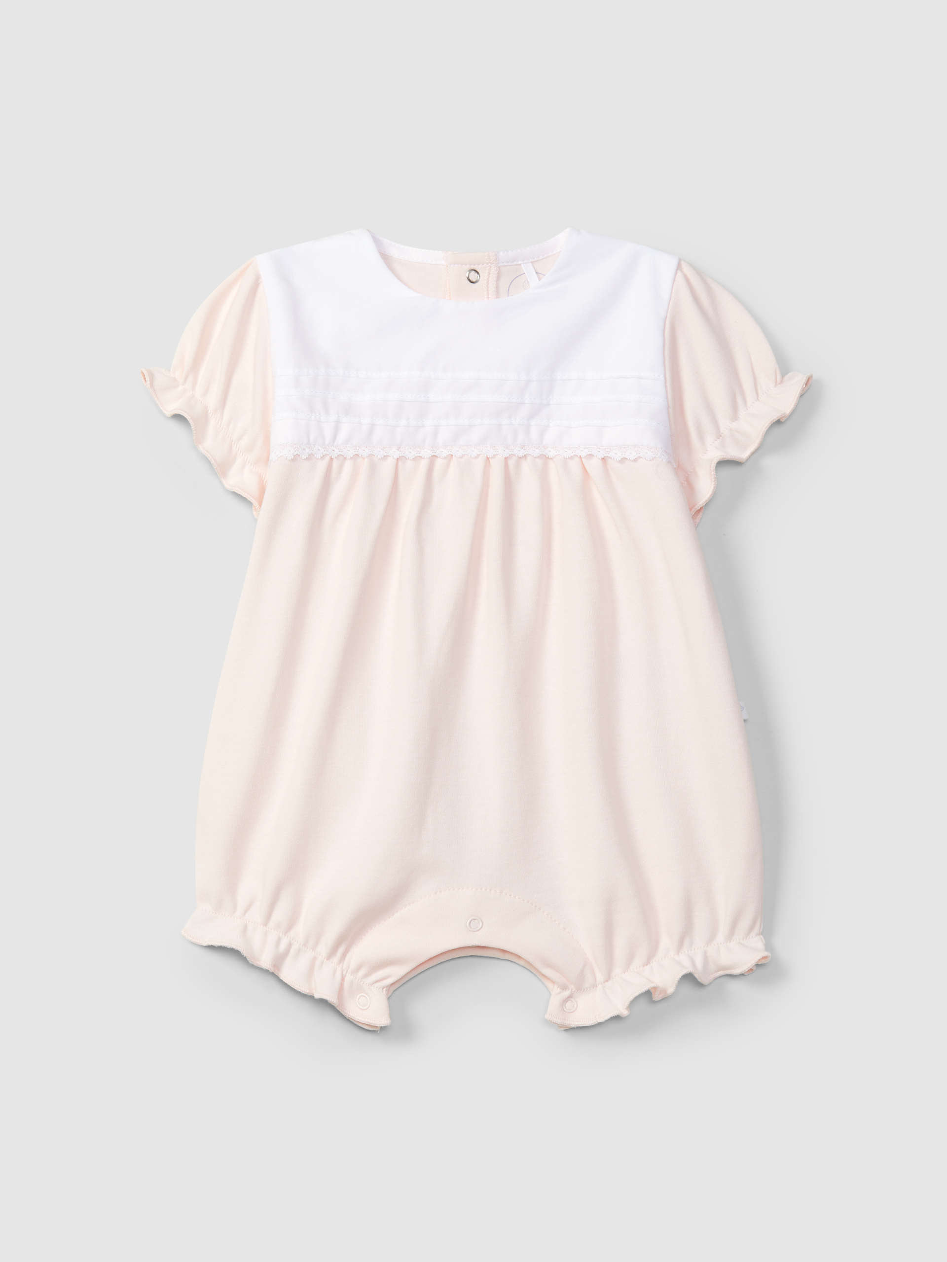 Shortie with pleats and delicate lace