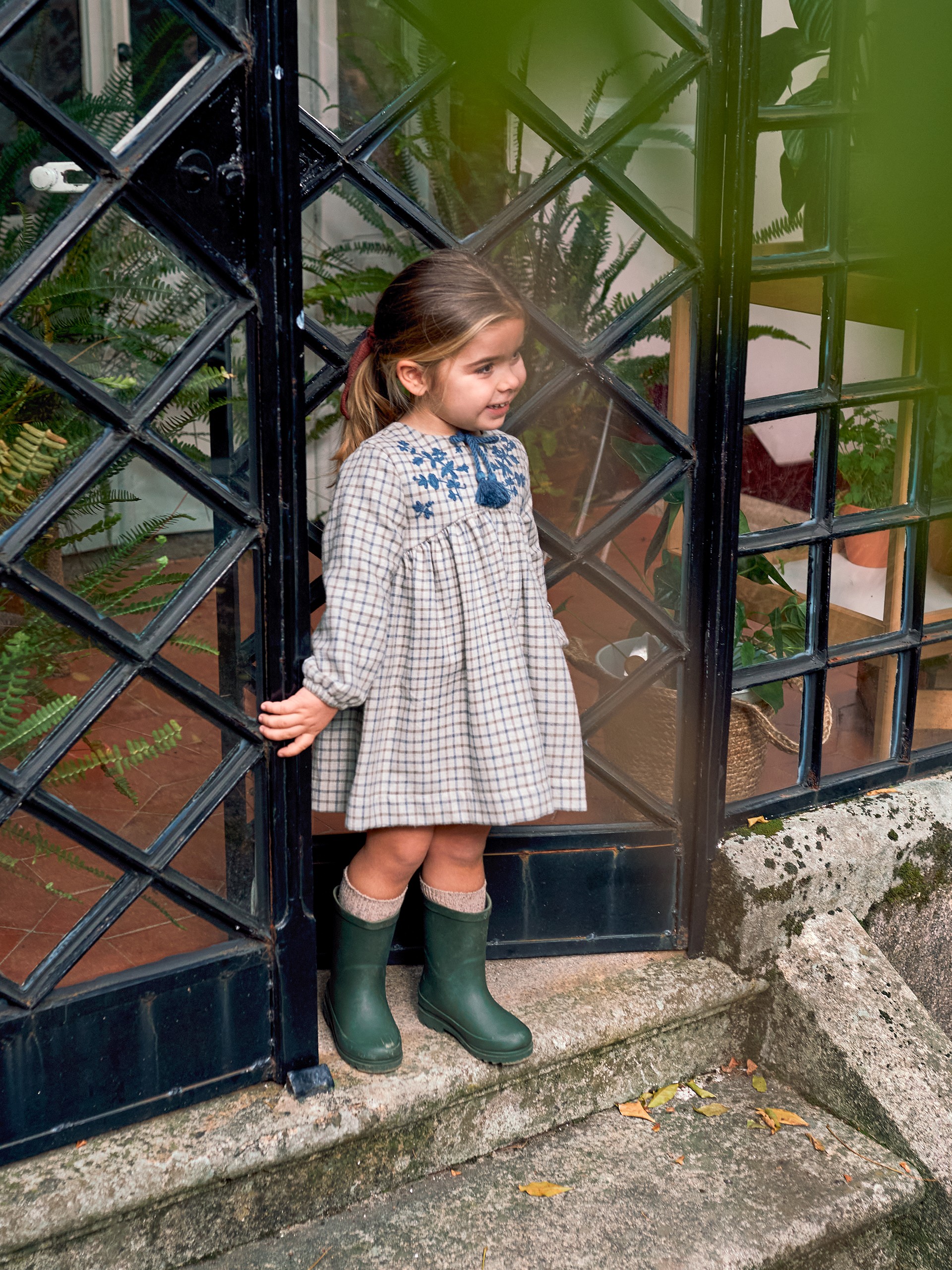 Check dress embroidered with wool thread