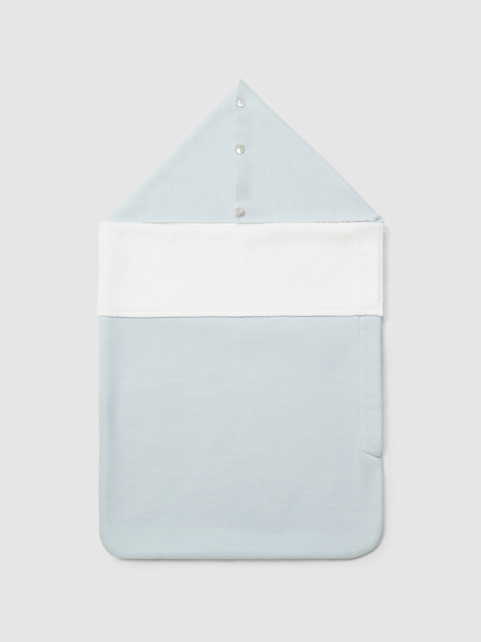 Double jersey sleeping blanket with faux fur interior