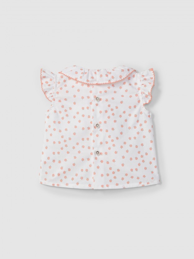 Blouse with contrast colour details Blouse with contrast colour details