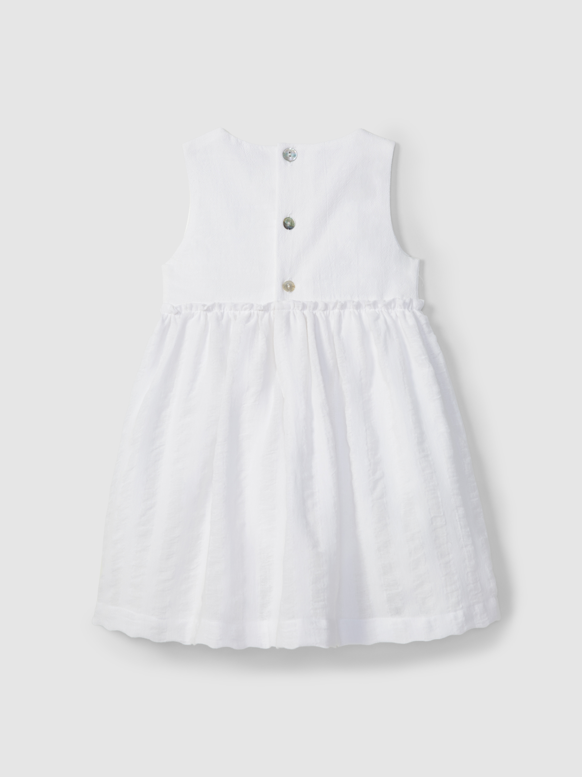 Vestido linho com aspecto natural e detalhe em croché