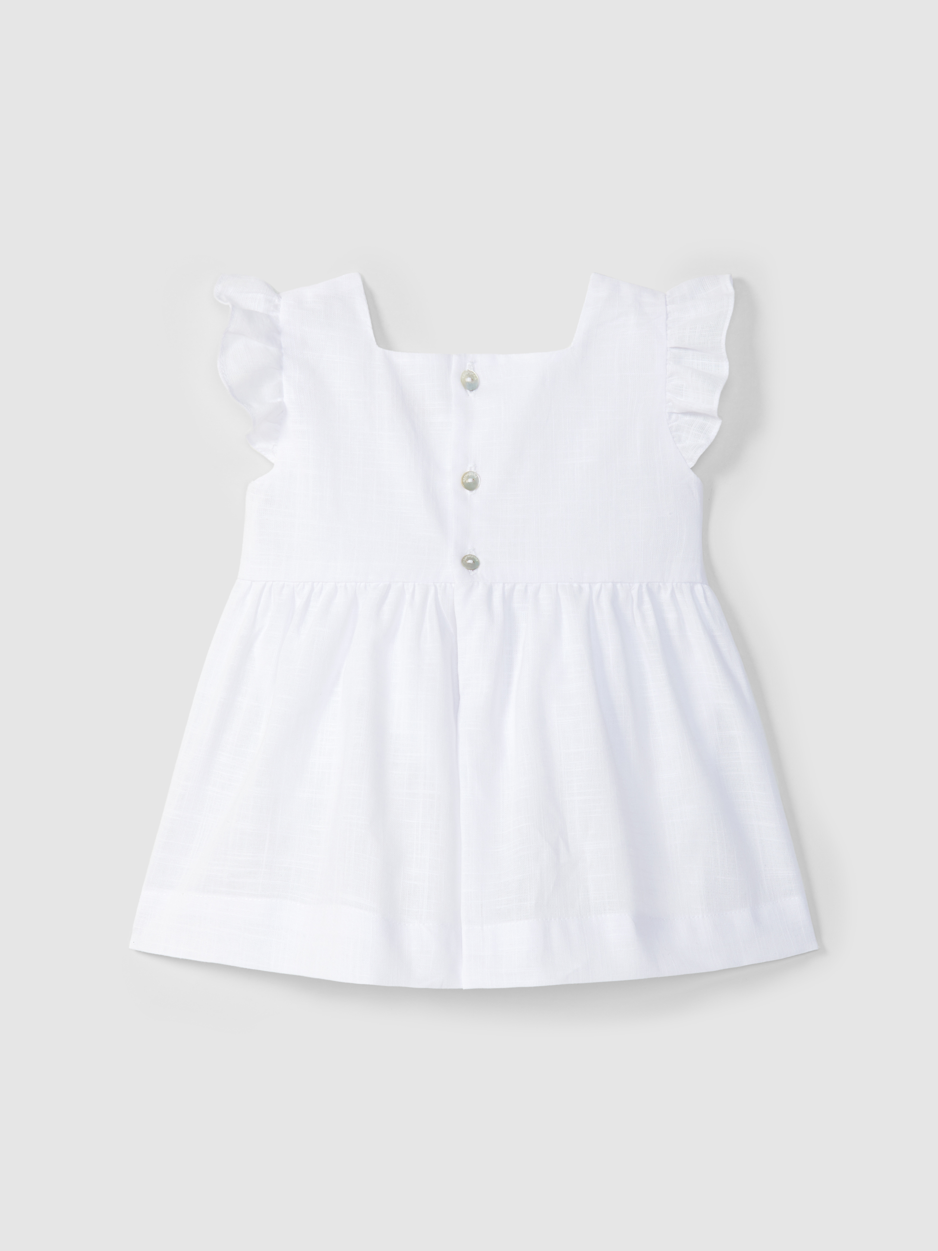 Vestido em algodão texturado com smocks no peito