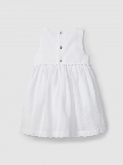 Linen dress with natural appearance and crochet detail Linen dress with natural appearance and crochet detail