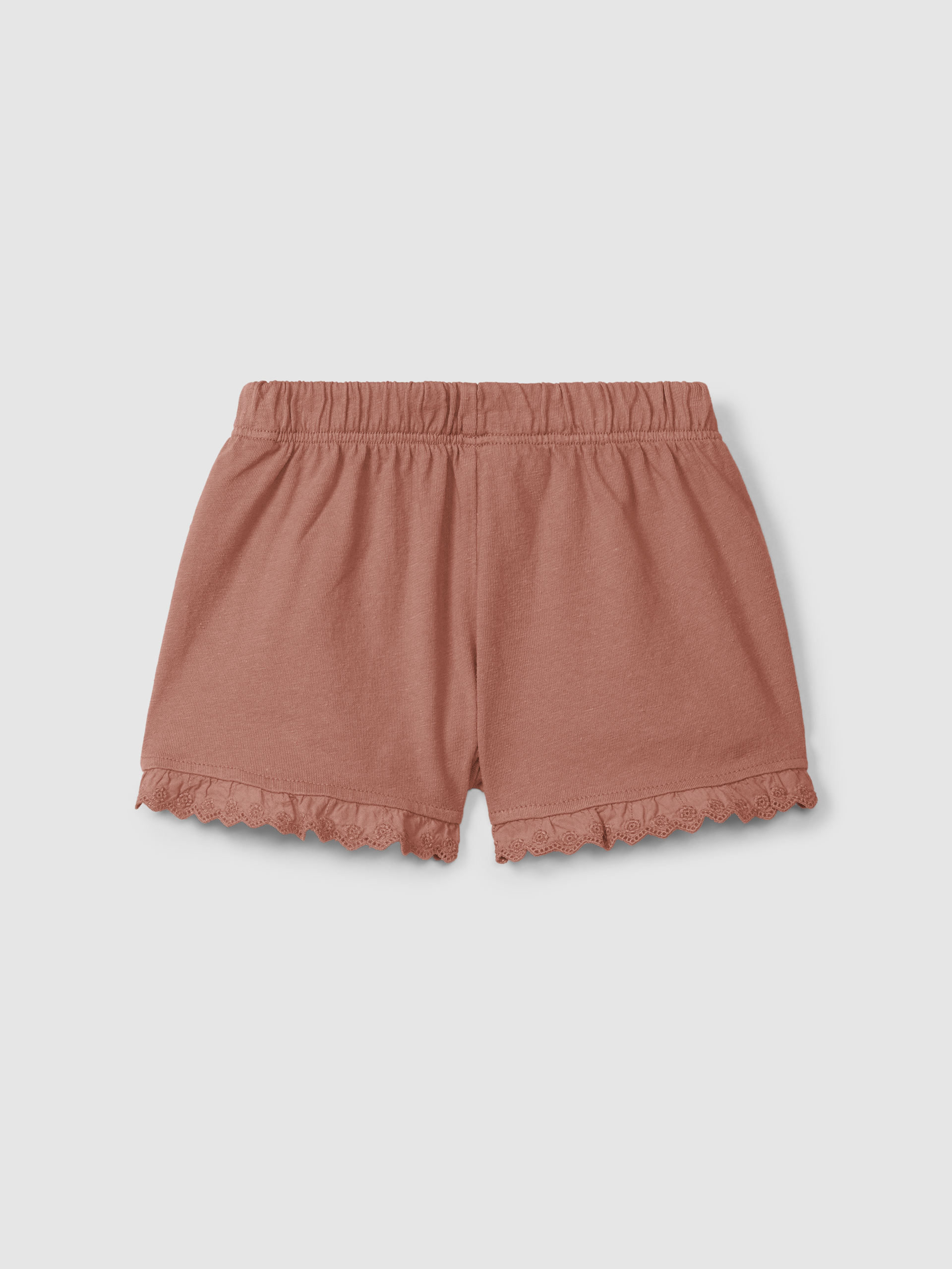 Calções pull-up em malha lisa com detalhes bordados