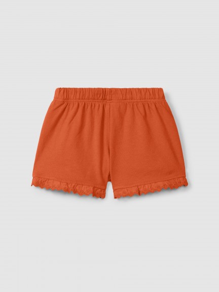 Short pull-up en maille unie avec détails brodés Short pull-up en maille unie avec détails brodés