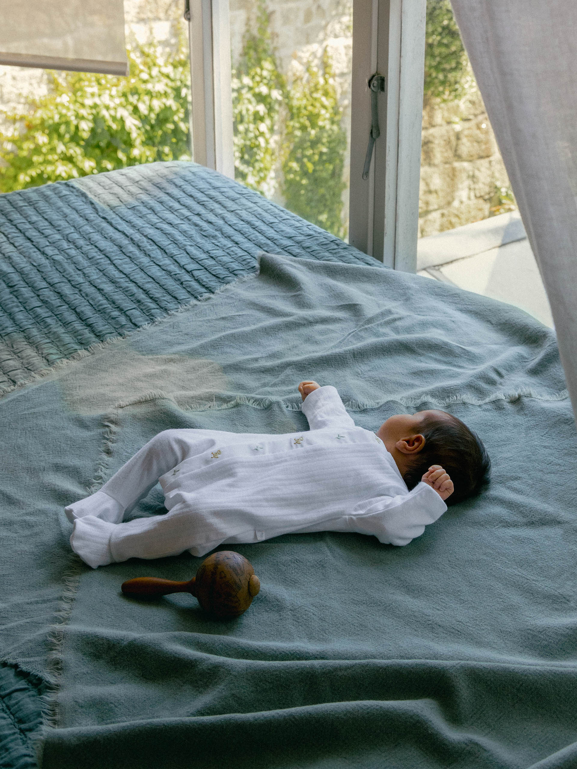 Babygrow in organic cotton with embroidered detail