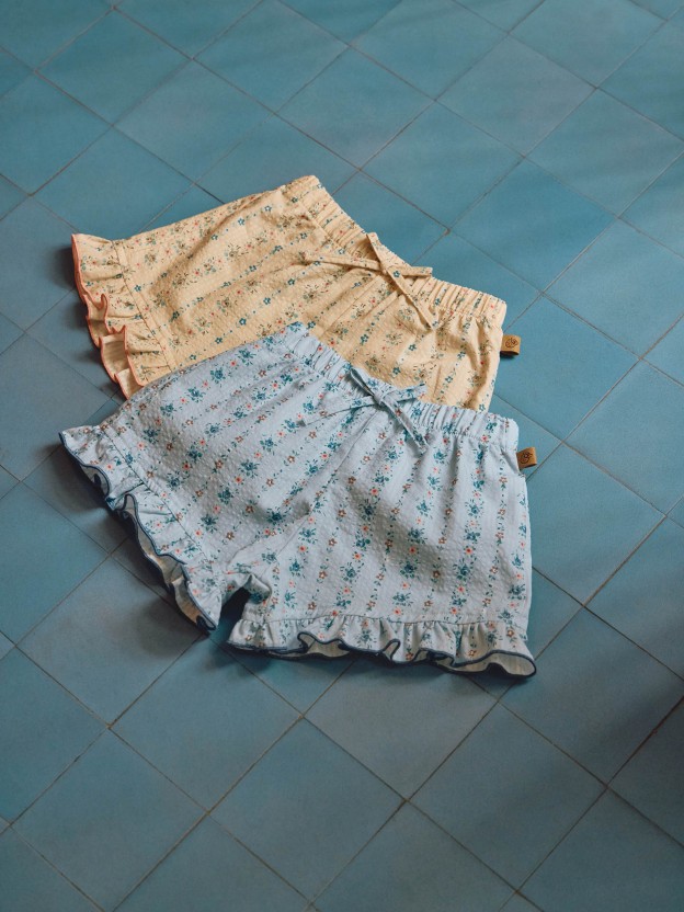 Cal��es pull-up estampado floral com detalhe de folho