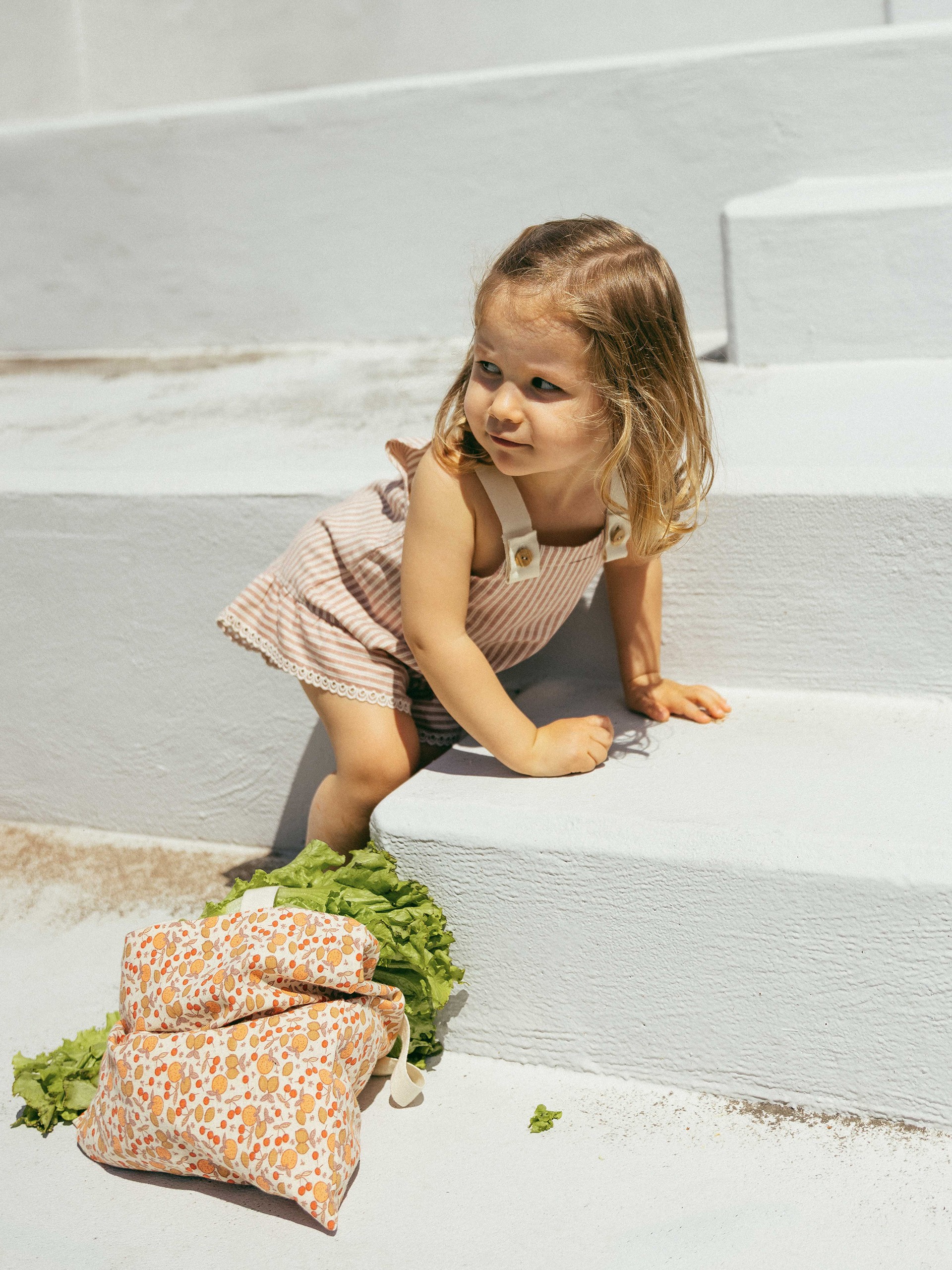Overalls in striped fabric and English embroidery detail