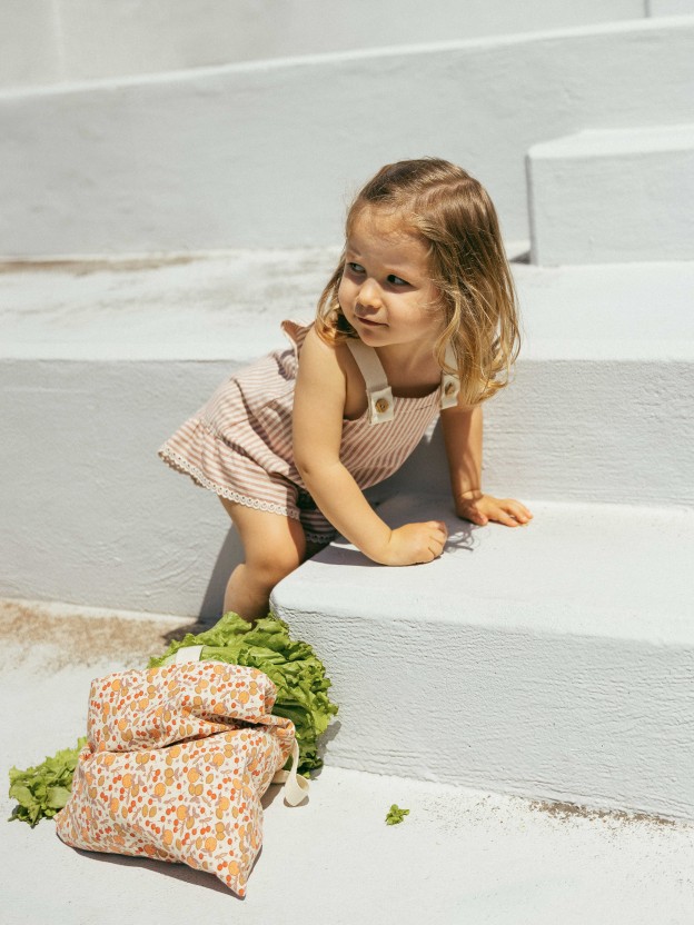 Overalls in striped fabric and English embroidery detail Overalls in striped fabric and English embroidery detail