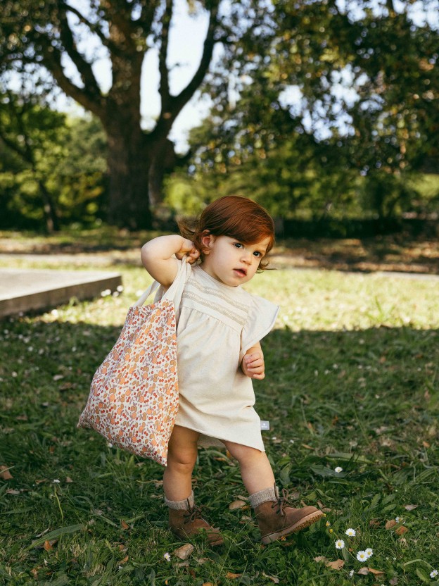 Vestido con detalle de cinta trenzada