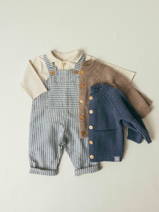 Dungarees in striped fabric with pocket Dungarees in striped fabric with pocket