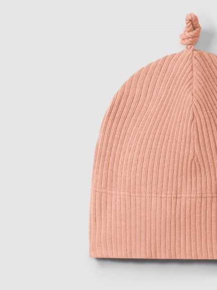 Bonnet avec nœud en maille cannelée Bonnet avec nœud en maille cannelée