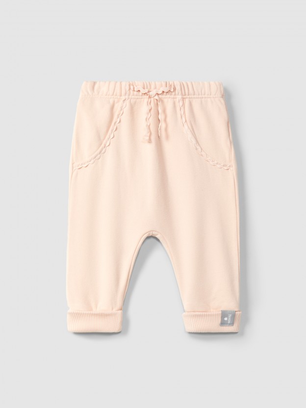 Pantalones pull-up en felpa con detalle en picunela Pantalones pull-up en felpa con detalle en picunela