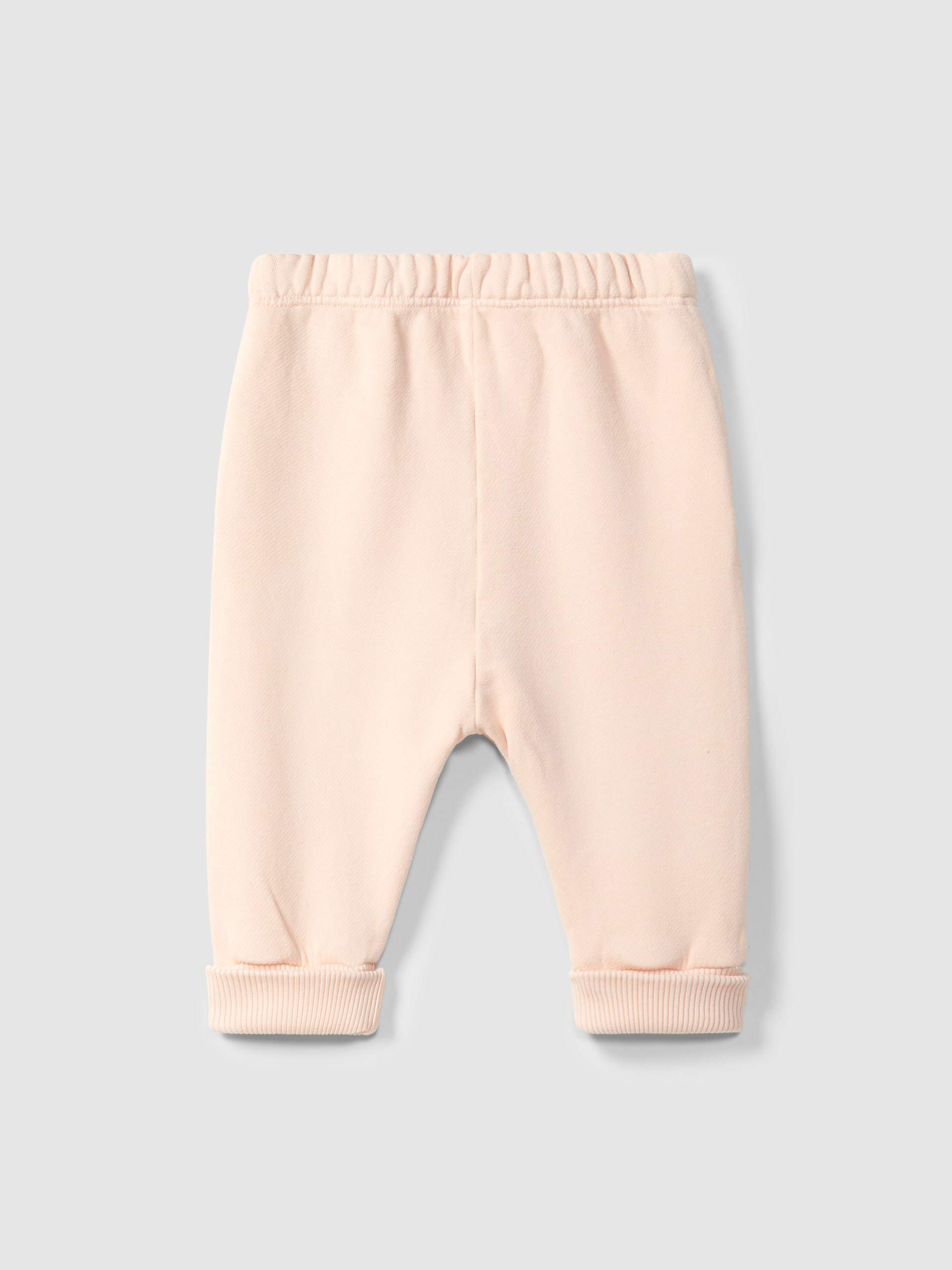 Pantalones pull-up en felpa con detalle en picunela
