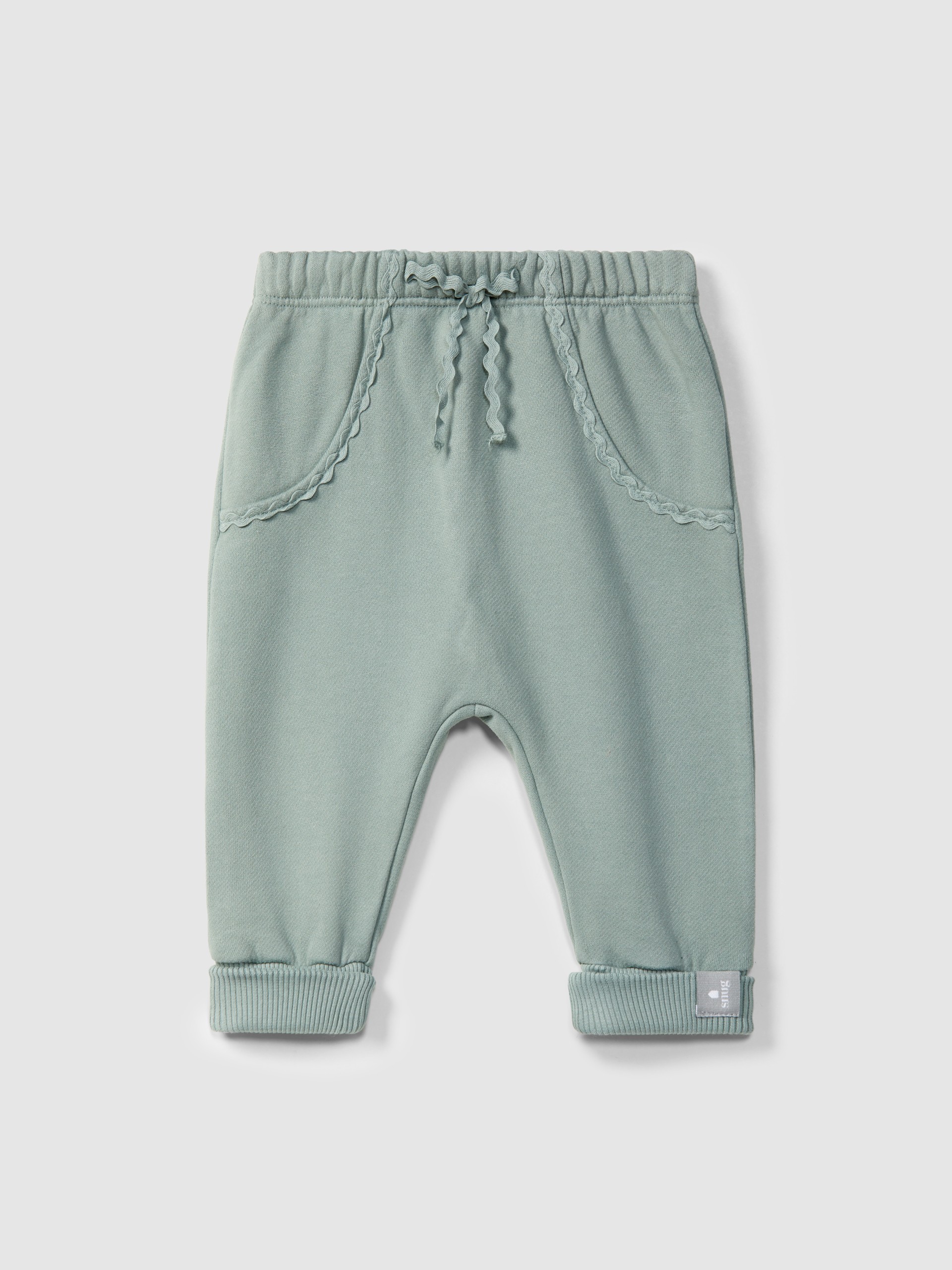 Pantalones pull-up en felpa con detalle en picunela