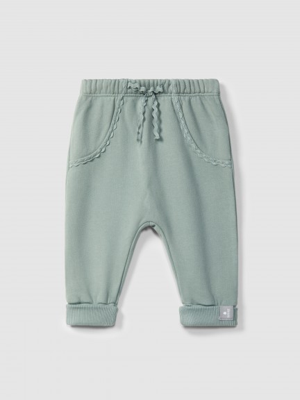 Pantalones pull-up en felpa con detalle en picunela