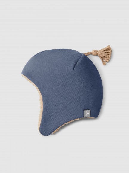 Bonnet en peluche avec pompon et doublure en fourrure