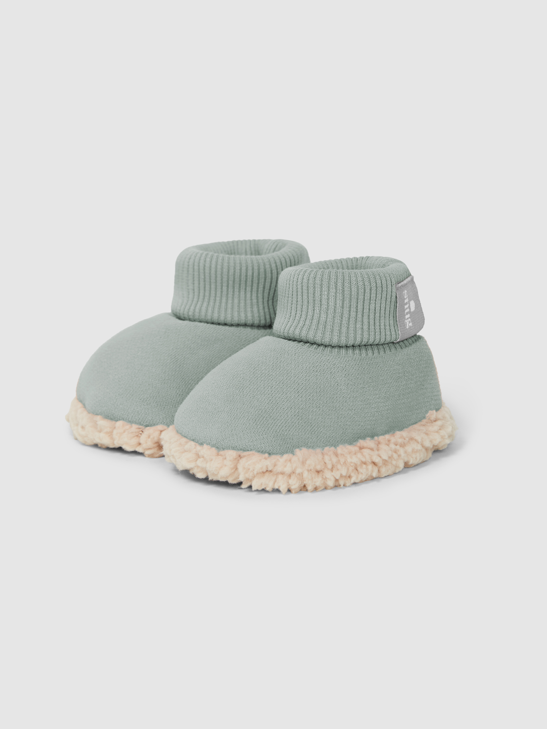 Botines en felpa con detalle de pelo