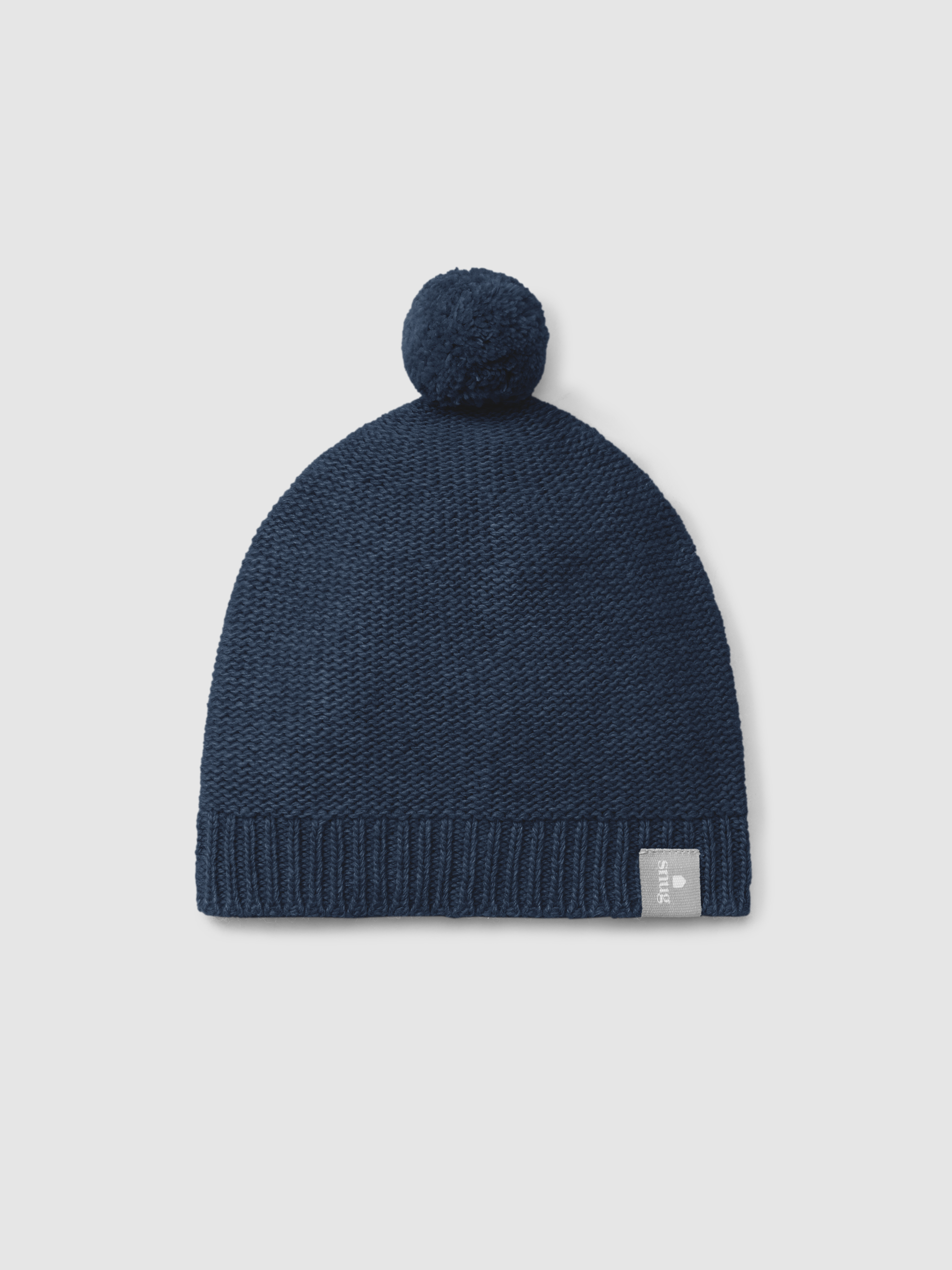 Gorro tricotado com pom-pom