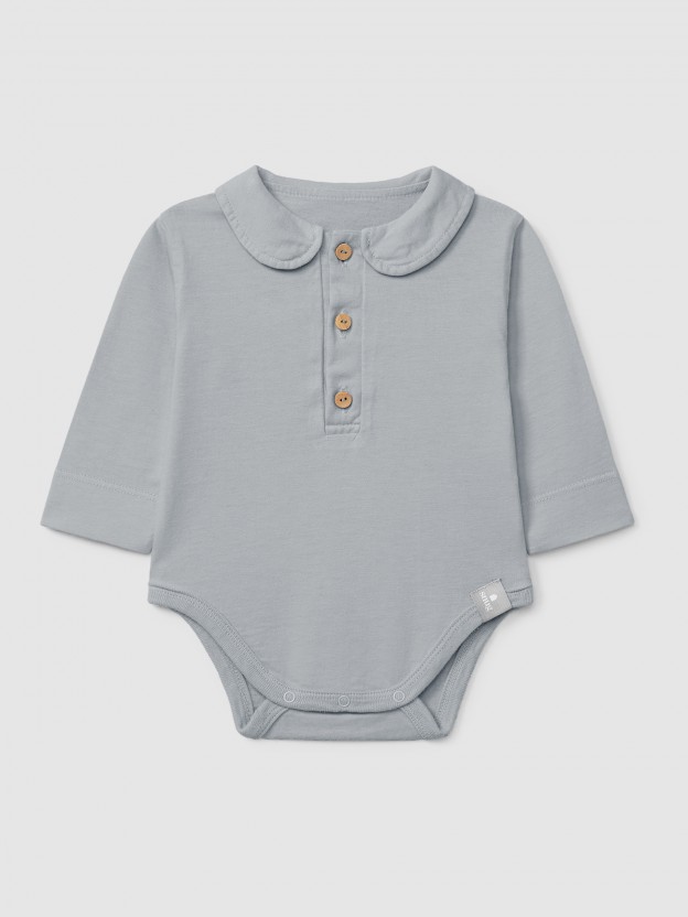 Body liso con cuello peter-pan en algodón orgánico Body liso con cuello peter-pan en algodón orgánico