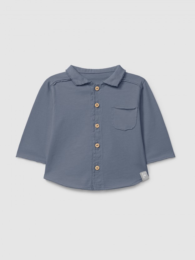 Polo con cuello de pico en algodón orgánico Polo con cuello de pico en algodón orgánico