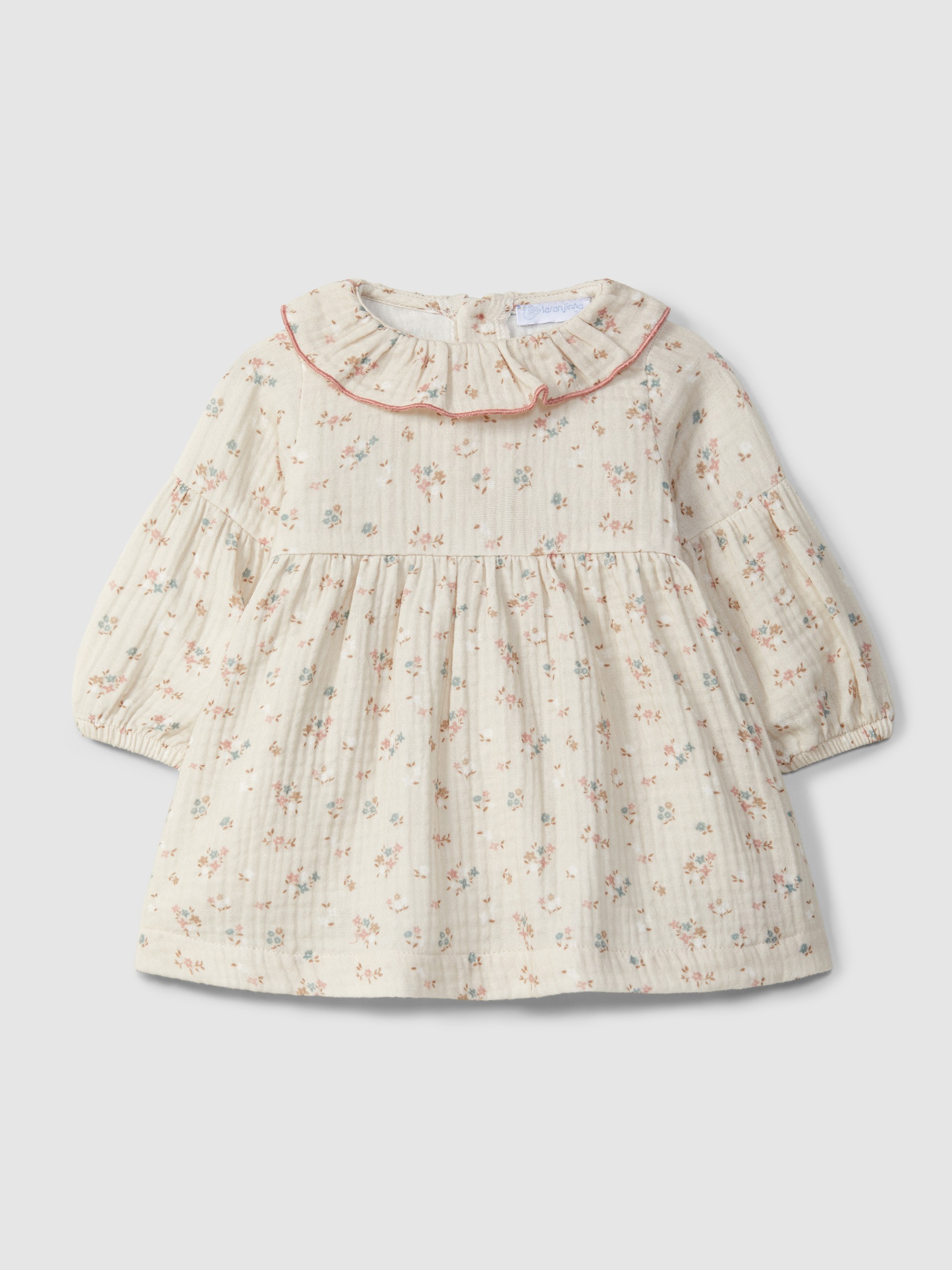 Robe en gaze fleurie à col à volant