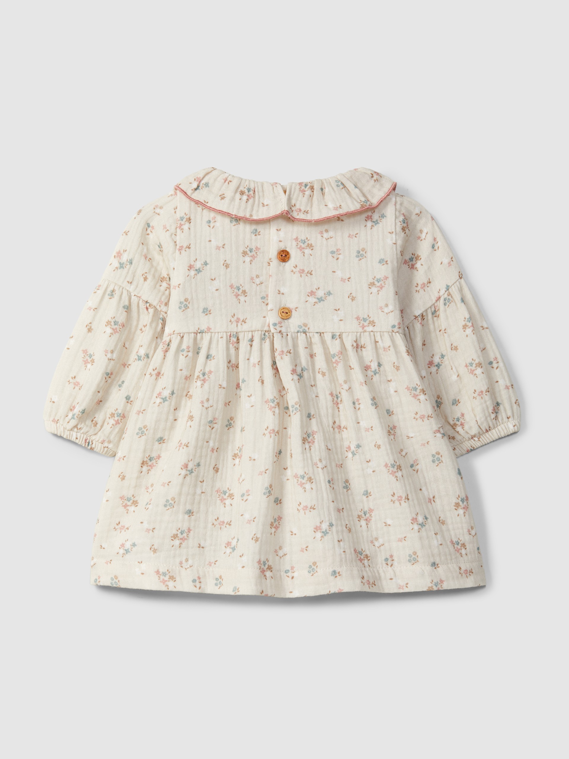 Robe en gaze fleurie à col à volant