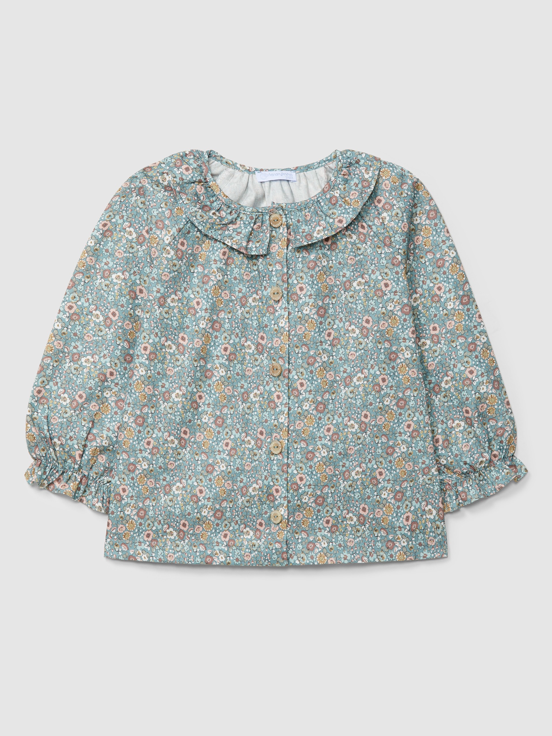 Blusa estampada com gola de folho