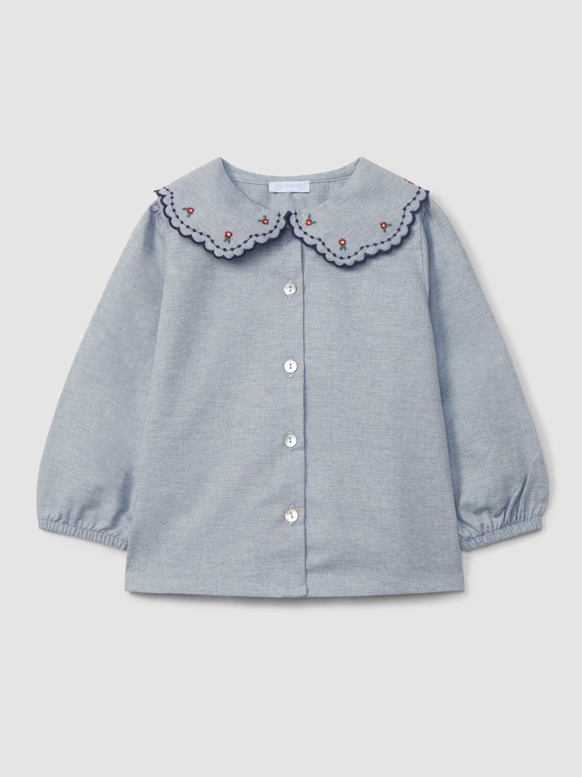 Blouse in viyella fabric with embroidered detail on the collar
