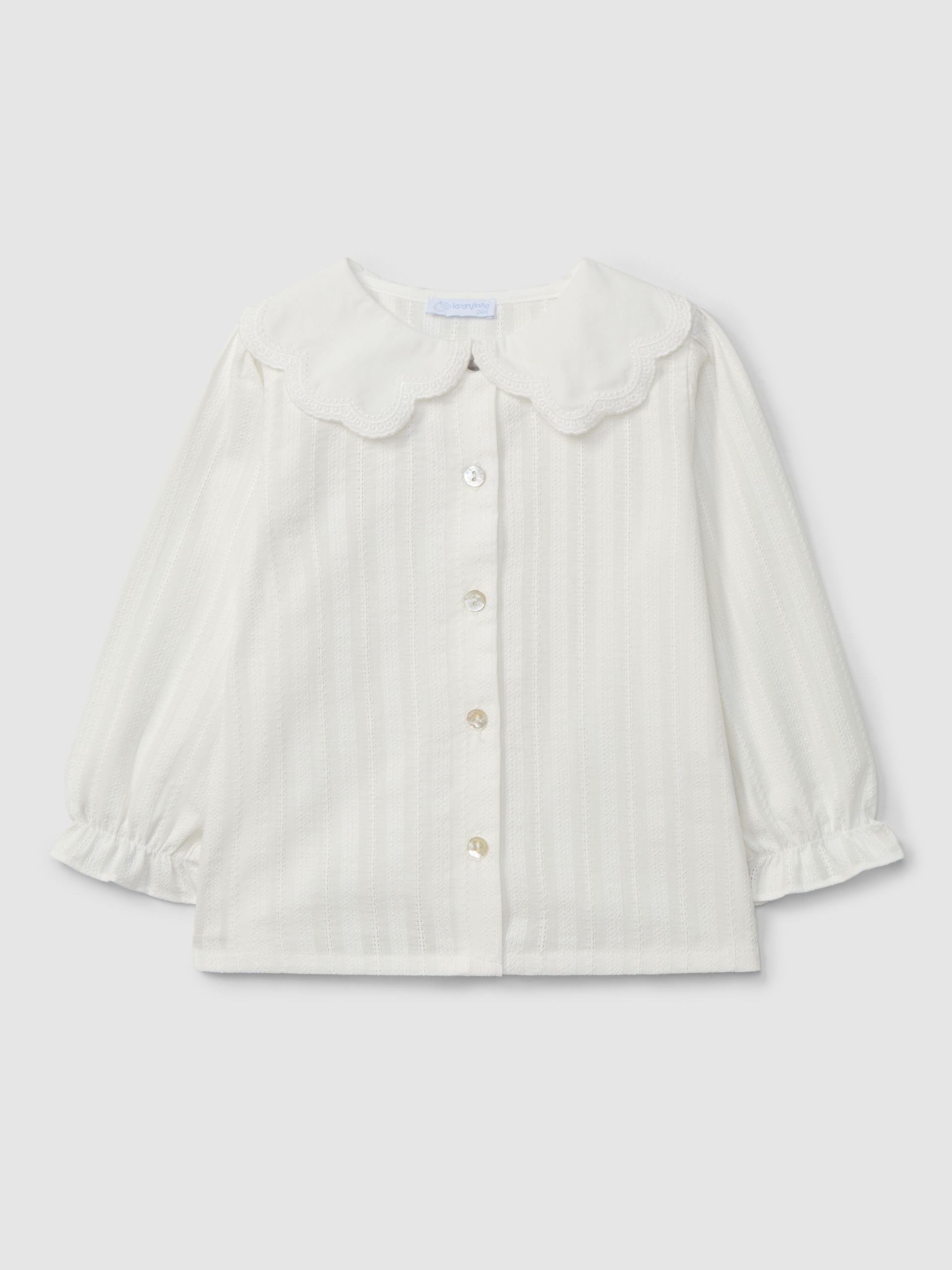 Blusa em tecido texturado delicado