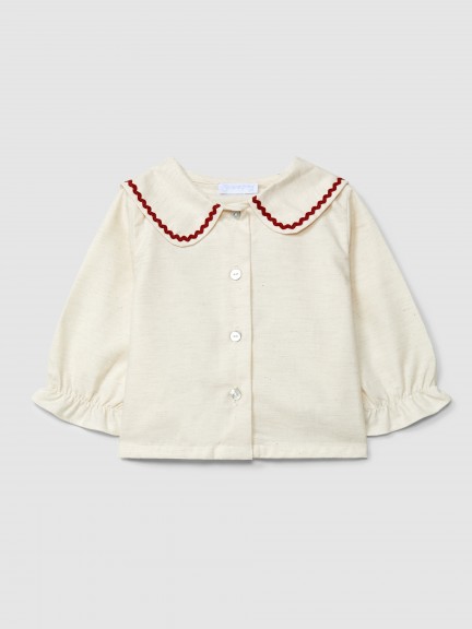 Blusa com detalhe de espiguilha em cor contraste Blusa com detalhe de espiguilha em cor contraste