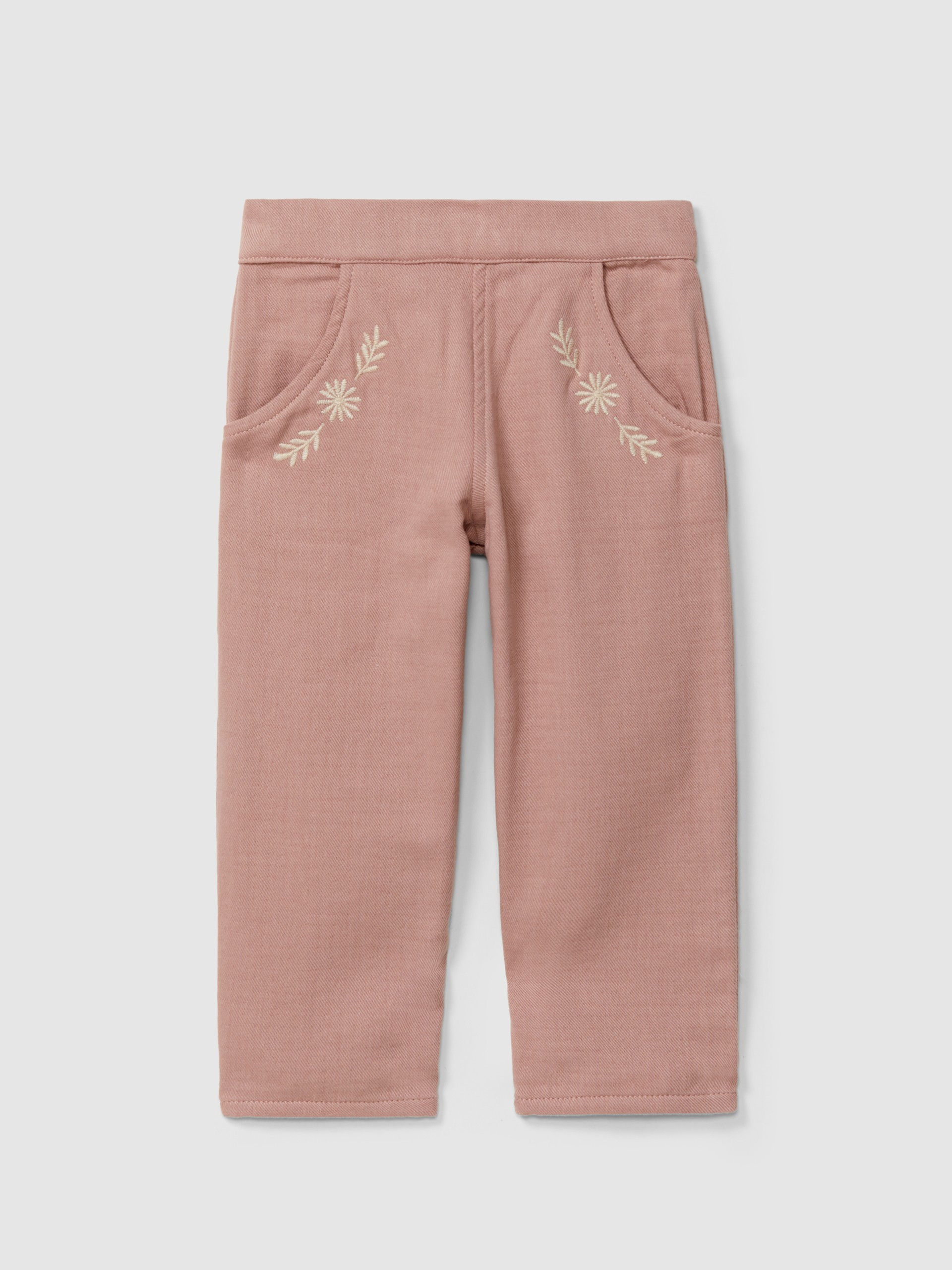 Pantalón pull-up con detalle bordado y picunela