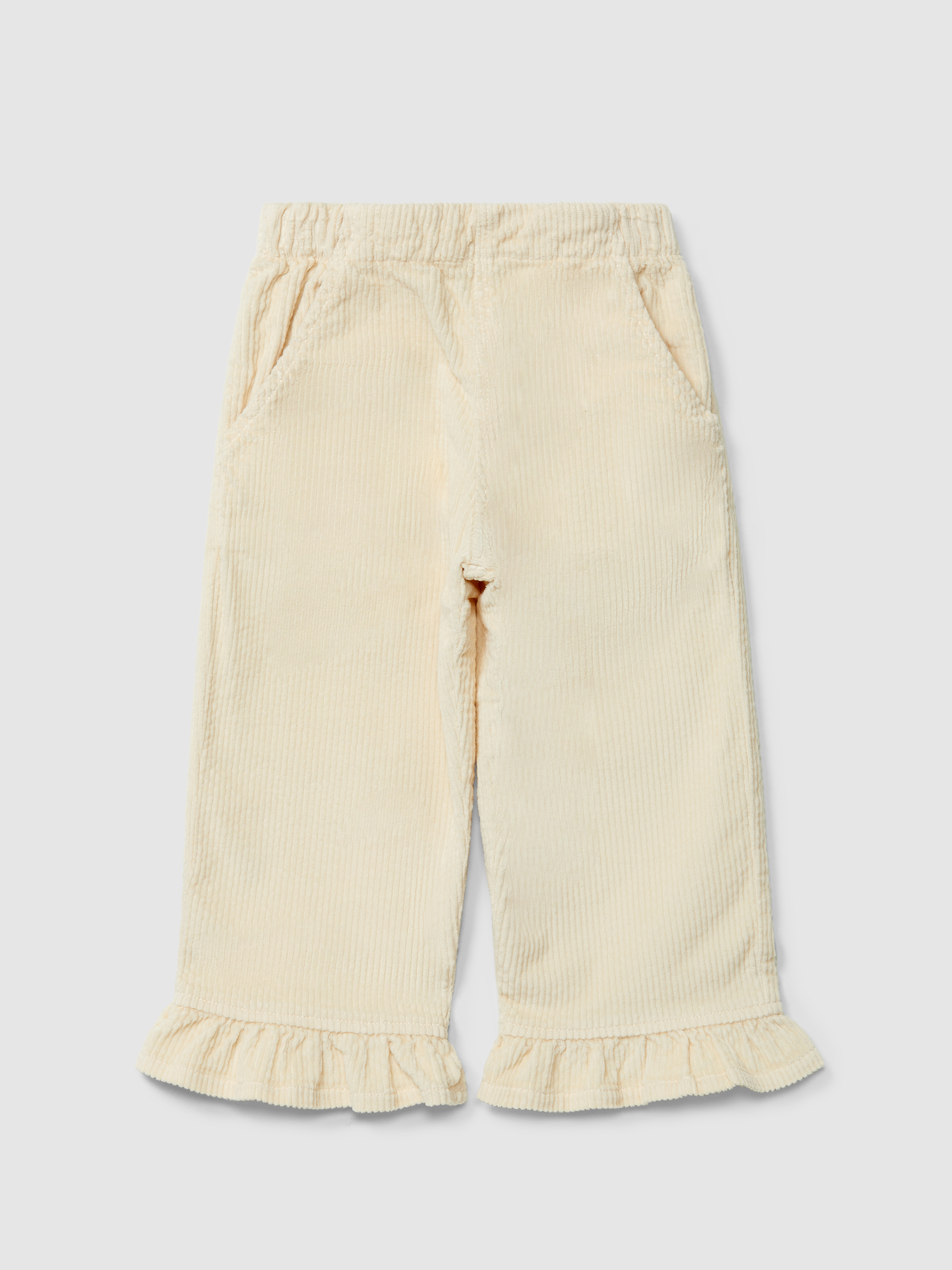 Pull-up pants in corduroy with ruffled detail