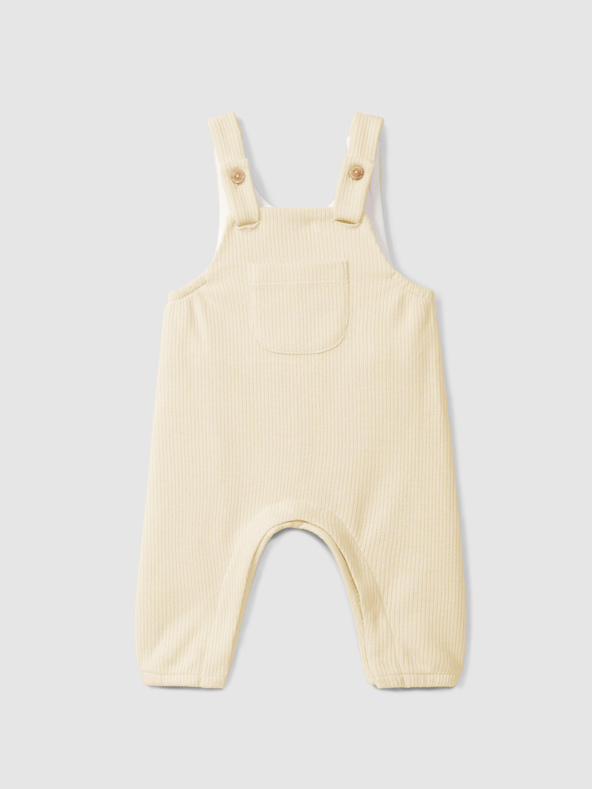 Dungarees in organic cotton with pocket