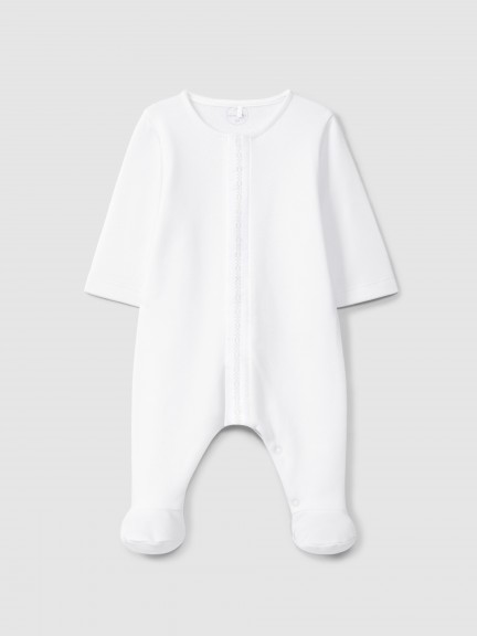 Babygrow with cross stitch embroidery detail Babygrow with cross stitch embroidery detail