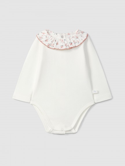 Body col � volant � fleurs et d�tail de liser�