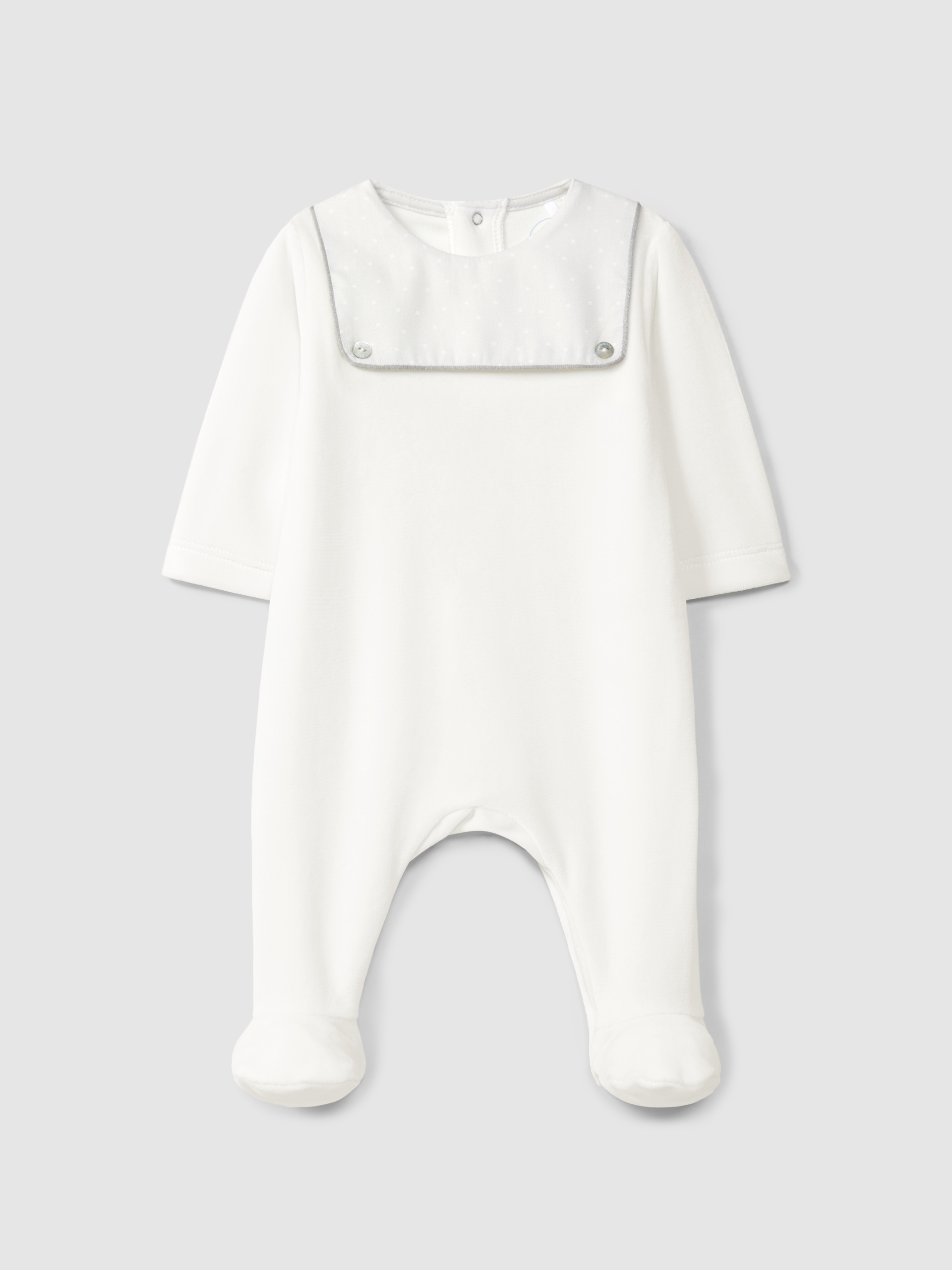 Mono de bebé en terciopelo con detalle en tejido estampado