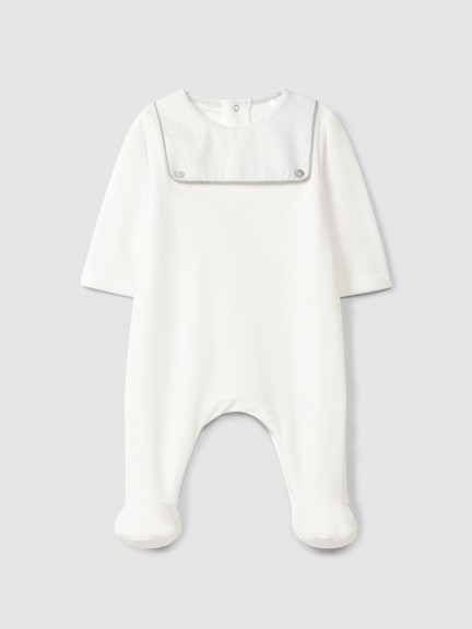 Babygrow in velvet with print fabric detail Babygrow in velvet with print fabric detail