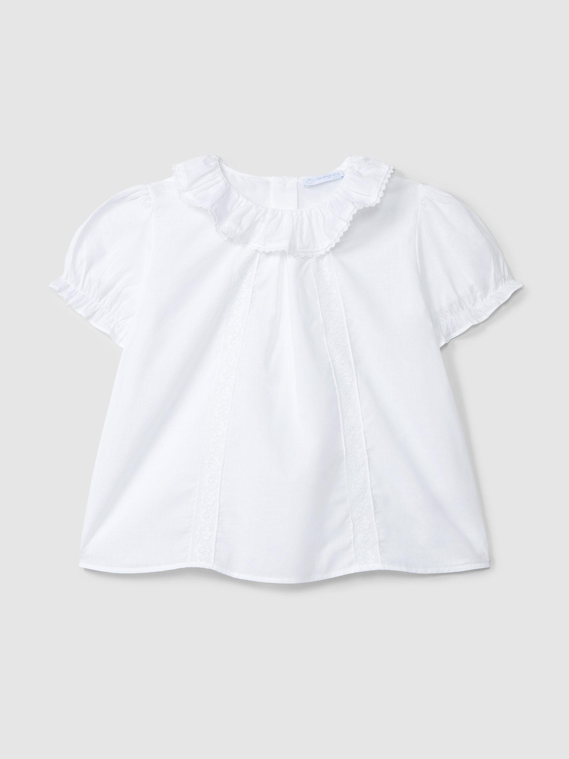 Blusa con detalles en encaje
